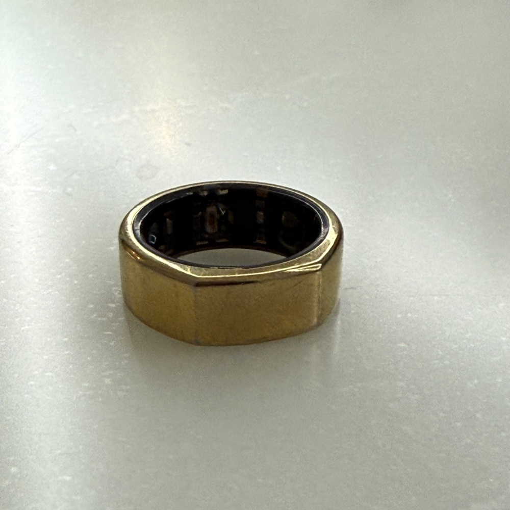 Oura Gold and Black Geometric Ring Wearable
